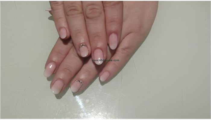 Que Belleza Unisex Salon & Nail Studio.